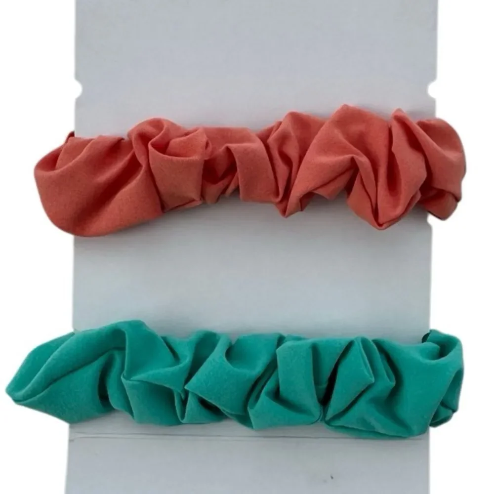 2 Lululemon Uplifting Scrunchies: Wander Teal and Coral Kiss NWOT